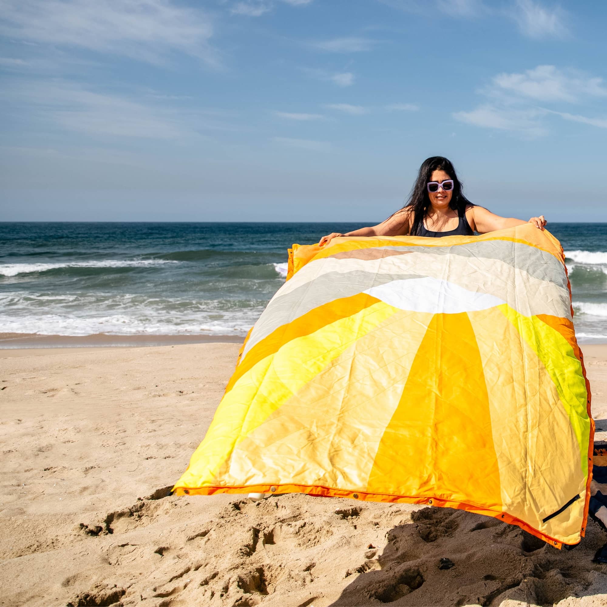 Beach blanket on sale repels sand